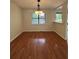 Charming dining room with hardwood floors and natural lighting at 5250 Mountain Village Ct, Stone Mountain, GA 30083