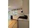 Well-lit kitchen with white cabinets and modern appliances at 5250 Mountain Village Ct, Stone Mountain, GA 30083