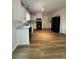 Clean kitchen featuring white cabinets and black appliances at 5250 Mountain Village Ct, Stone Mountain, GA 30083