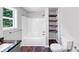 Modern bathroom featuring a shower-tub combination and built-in shelving at 212 Lake Forest Dr, Acworth, GA 30102