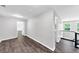 Hallway with gray walls and hardwood floors at 212 Lake Forest Dr, Acworth, GA 30102