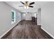 Spacious living area with dark hardwood floors and open access to the kitchen at 212 Lake Forest Dr, Acworth, GA 30102