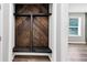 Mudroom entryway featuring a storage and seating nook at 212 Lake Forest Dr, Acworth, GA 30102