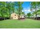 Expansive backyard featuring a spacious lawn and deck perfect for outdoor gatherings and relaxation at 2929 Alberta Dr, Marietta, GA 30062