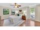 Bright bedroom with hardwood floors and a ceiling fan offers a serene space at 2929 Alberta Dr, Marietta, GA 30062