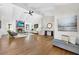 Large living room with hardwood floors, stone fireplace, and an open layout for versatile living at 2929 Alberta Dr, Marietta, GA 30062