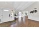 Inviting entryway with wood floors and white wainscoting offering a glimpse into the living spaces at 2929 Alberta Dr, Marietta, GA 30062