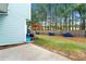 A fenced backyard featuring a patio and grassy area, perfect for outdoor activities and relaxation at 4100 Howell Park Rd, Duluth, GA 30096