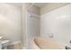Bathroom featuring a tub-shower combination with white tiling and neutral walls at 4100 Howell Park Rd, Duluth, GA 30096
