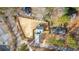 Aerial view of the property showing the fence and layout of the yard, driveway, and home at 4806 Forest Trl, Douglasville, GA 30135