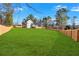 Expansive, fenced backyard offering ample space for outdoor activities and privacy at 4806 Forest Trl, Douglasville, GA 30135
