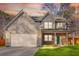 Charming two-story home featuring a spacious two-car garage and a welcoming covered front porch at 4806 Forest Trl, Douglasville, GA 30135