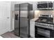 Well lit kitchen featuring stainless steel appliances, gas range, and island at 4806 Forest Trl, Douglasville, GA 30135