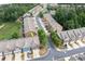 Aerial view of townhome community featuring tree-lined streets and well-maintained landscaping at 1957 Brightleaf Way # 59, Marietta, GA 30060