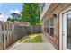 Cozy backyard with a patio, small lawn, and wood fence perfect for relaxing or entertaining at 1957 Brightleaf Way # 59, Marietta, GA 30060
