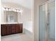 Bathroom features a double sink vanity, soaking tub and a glass-enclosed shower stall at 1957 Brightleaf Way # 59, Marietta, GA 30060