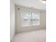 Bedroom featuring neutral walls, plush carpet and a window allowing for lots of natural light at 1957 Brightleaf Way # 59, Marietta, GA 30060