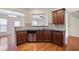Features include granite countertops, wooden cabinets and stainless steel dishwasher at 1957 Brightleaf Way # 59, Marietta, GA 30060