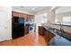 Features include granite countertops, wooden cabinets, stainless steel appliances and hardwood floors at 1957 Brightleaf Way # 59, Marietta, GA 30060
