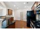 Features include granite countertops, wooden cabinets and stainless steel appliances at 1957 Brightleaf Way # 59, Marietta, GA 30060