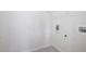 Laundry room with white walls and tile flooring at 1957 Brightleaf Way # 59, Marietta, GA 30060