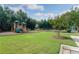 Community playground area with swings and play structure at 1957 Brightleaf Way # 59, Marietta, GA 30060