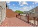 Wooden back deck and brick wall, perfect for outdoor entertaining at 3133 Dunton Se St, Smyrna, GA 30080