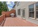 Spacious back deck area with a wooden floor and a grill at 3133 Dunton Se St, Smyrna, GA 30080