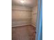 Walk-in closet with carpet floor and white wire shelving at 3133 Dunton Se St, Smyrna, GA 30080