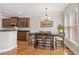 Inviting dining area with hardwood floors, ample natural light, and modern chandelier at 3133 Dunton Se St, Smyrna, GA 30080