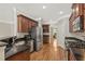 Well-lit kitchen featuring stainless steel appliances, dark countertops, and hardwood floors at 3133 Dunton Se St, Smyrna, GA 30080