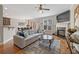 Bright living room with hardwood floors, a fireplace, and neutral colors at 3133 Dunton Se St, Smyrna, GA 30080