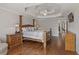 Main bedroom boasts hardwood floors, tray ceiling, and neutral décor at 3133 Dunton Se St, Smyrna, GA 30080