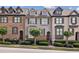 Charming townhomes with brick and stucco exteriors and well-maintained landscaping at 3133 Dunton Se St, Smyrna, GA 30080