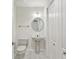 Neat powder room with a pedestal sink and a tiled floor at 3475 Oak Valley Ne Rd # 2060, Atlanta, GA 30326