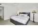 Comfortable bedroom featuring a king-size bed, carpet, and large windows at 3475 Oak Valley Ne Rd # 2060, Atlanta, GA 30326