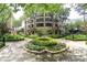 Landscaped gardens and walkways surrounding a luxurious residential building at 3475 Oak Valley Ne Rd # 2060, Atlanta, GA 30326