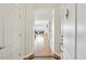Bright hallway with hardwood floors leading to a modern living area at 3475 Oak Valley Ne Rd # 2060, Atlanta, GA 30326
