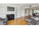 Bright living room with a fireplace and built-in bookshelves at 3475 Oak Valley Ne Rd # 2060, Atlanta, GA 30326