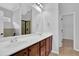 Bathroom features dual sinks, tile floors, walk-in shower and granite countertops at 3513 Newtons Crest Cir, Snellville, GA 30078