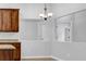 The kitchen features granite countertops and a cutout to another room at 3513 Newtons Crest Cir, Snellville, GA 30078