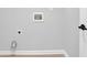 Unfinished laundry room with tile floors and white trim at 3513 Newtons Crest Cir, Snellville, GA 30078
