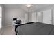 Bedroom featuring high ceilings, natural light, neutral paint, and an area for a work space at 4023 Caitlyn Pl, Atlanta, GA 30360