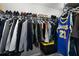 Well-organized walk-in closet with ample storage space for clothes and shoes at 4023 Caitlyn Pl, Atlanta, GA 30360