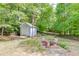 Large backyard with shed and fire pit at 4530 Bogan Gates Dr, Buford, GA 30519
