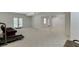 Expansive basement features neutral carpet, walkout, and open layout at 4530 Bogan Gates Dr, Buford, GA 30519