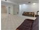 Open basement with neutral carpet and two sofas at 4530 Bogan Gates Dr, Buford, GA 30519