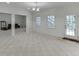 Open basement with windows and a partial view of stairs outside at 4530 Bogan Gates Dr, Buford, GA 30519