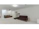 Large open basement with neutral carpet, perfect for entertaining at 4530 Bogan Gates Dr, Buford, GA 30519