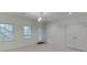 Finished basement featuring windows, double doors, and chandelier at 4530 Bogan Gates Dr, Buford, GA 30519